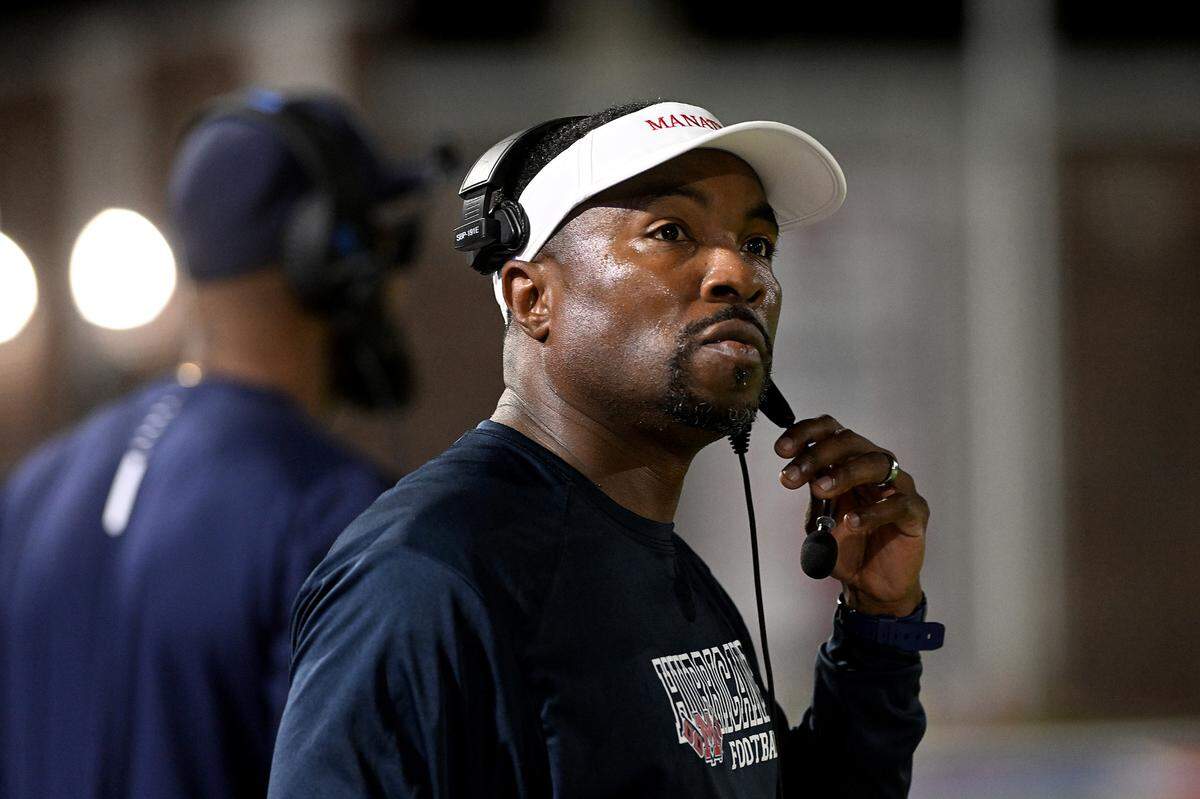 Manatee head football coach Jacquez Green on the sidelines against Sarasota Riverview at Joe Kinnan Field at Hawkins Stadium in this November 2023 Bradenton Herald file photo.