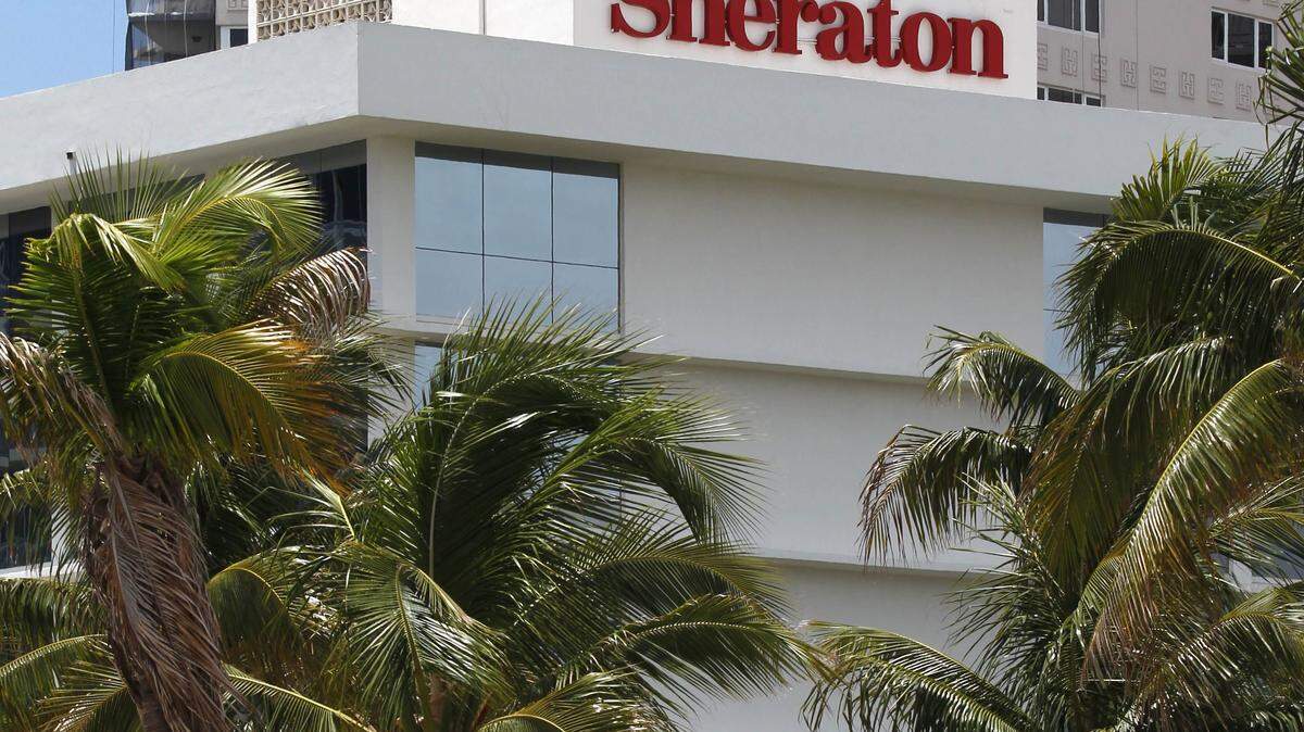 FILE - This July 25, 2011, file photo, shows the Sheraton Fort Lauderdale Beach Hotel, a member of the Starwood Hotels and Resorts group, in Fort Lauderdale, Fla. A fight for control of the Starwood hotel chain is under way after a buyout offer from a consortium led by Chinaís Anbang Insurance Group. Starwood Hotels & Resorts Worldwide Inc. said Monday, March 14, 2016, that it still favors the bid from Marriott, but that itís looking at the latest bid. (AP Photo/Wilfredo Lee, File)