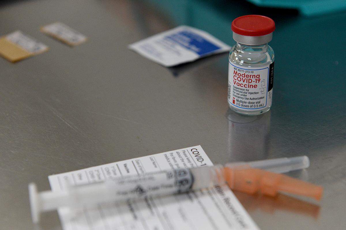 12/23/20--Public health officials in Manatee County will begin distributing the COVID-19 vaccine to senior citizen residents on Wednesday, Dec. 30. In this Bradenton Herald file photo, a vial of the Moderna vaccine is prepped for vaccinations of front line caregivers at Manatee Memorial Hospital.