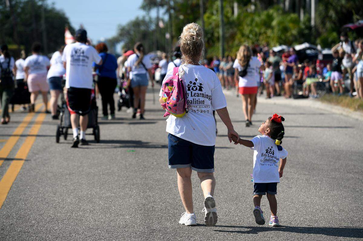 Members of the Early Learning Coalition march during the Hernando DeSoto Historical Society’s Children’s Parade on Friday, April 7, 2023 in Palmetto.