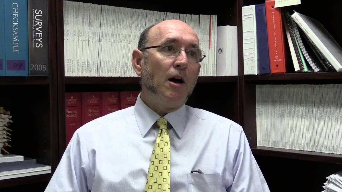 Medical Examiner Dr. Russell Vega