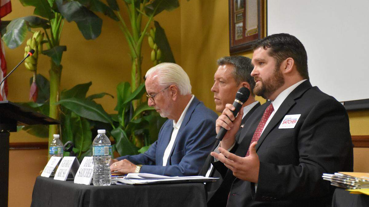 Conservative minister James Satcher (right) speaks at a District 7 Republican debate hosted by Tea Party Manatee. Real estate broker George Kruse (middle) and former county administrator Ed Hunzeker (left) participated, as well.