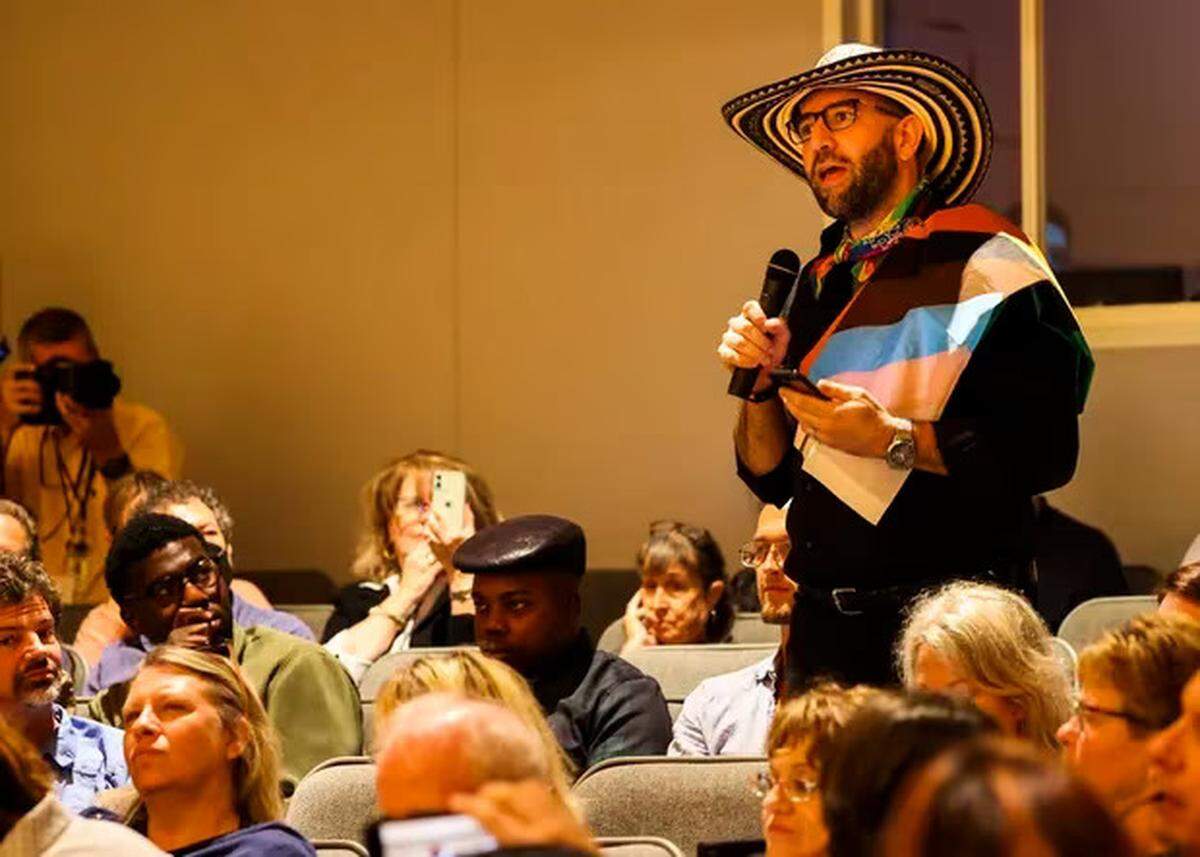 Diego Villada, an assistant professor of theatre and performance studies in the Humanities Division at New College, addresses two of the school’s new trustees, Jason “Eddie” Speir and Christopher Rufo, on Wednesday, Jan. 25, 2023.