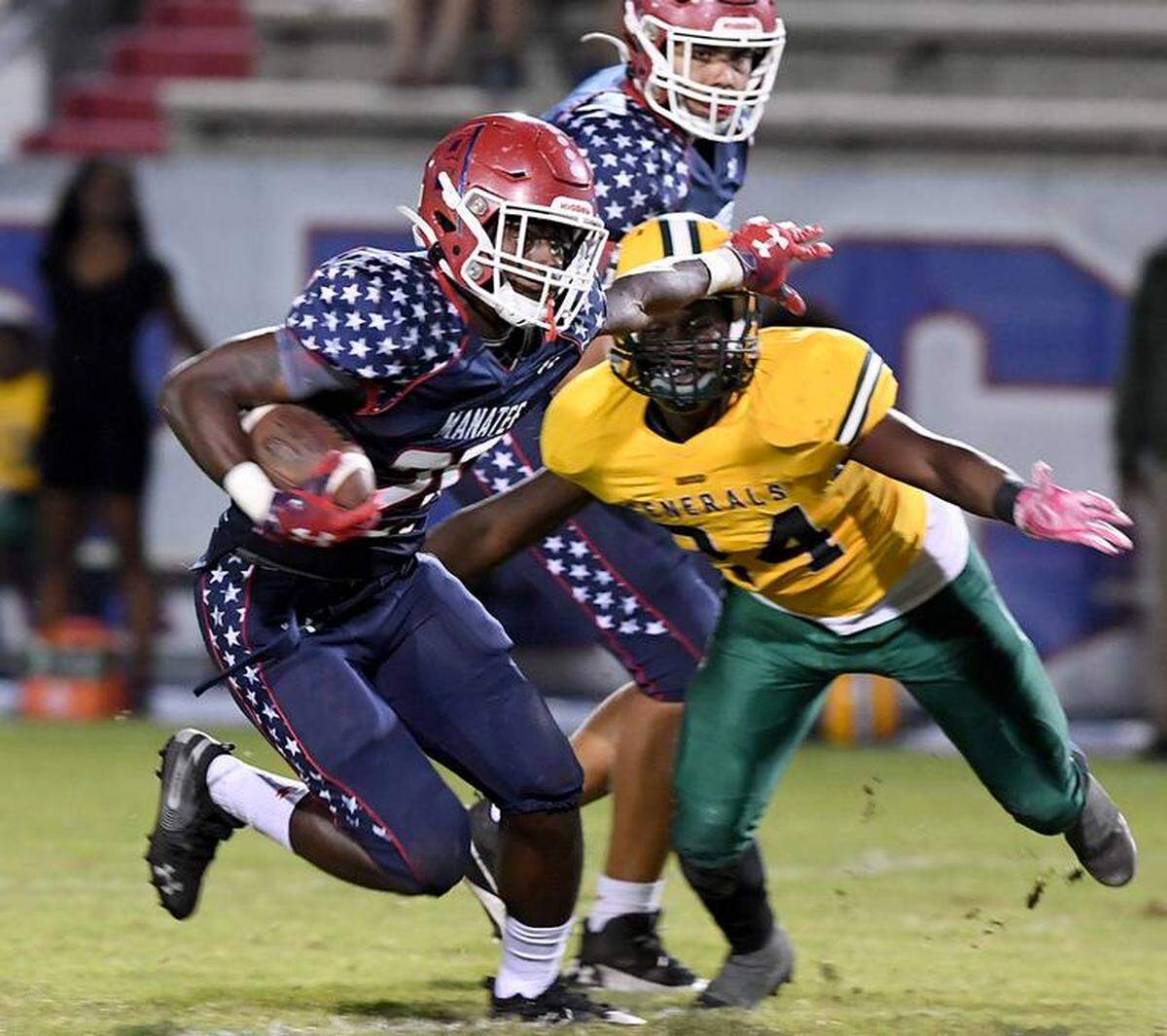 Manatee running back Tyson Phelps, shown against Miami Jackson in a regular-season game, had nine carries for 47 yards and a touchdown during Friday night’s Class 7A-Region 3 playoff victory against Largo Pinellas Park.