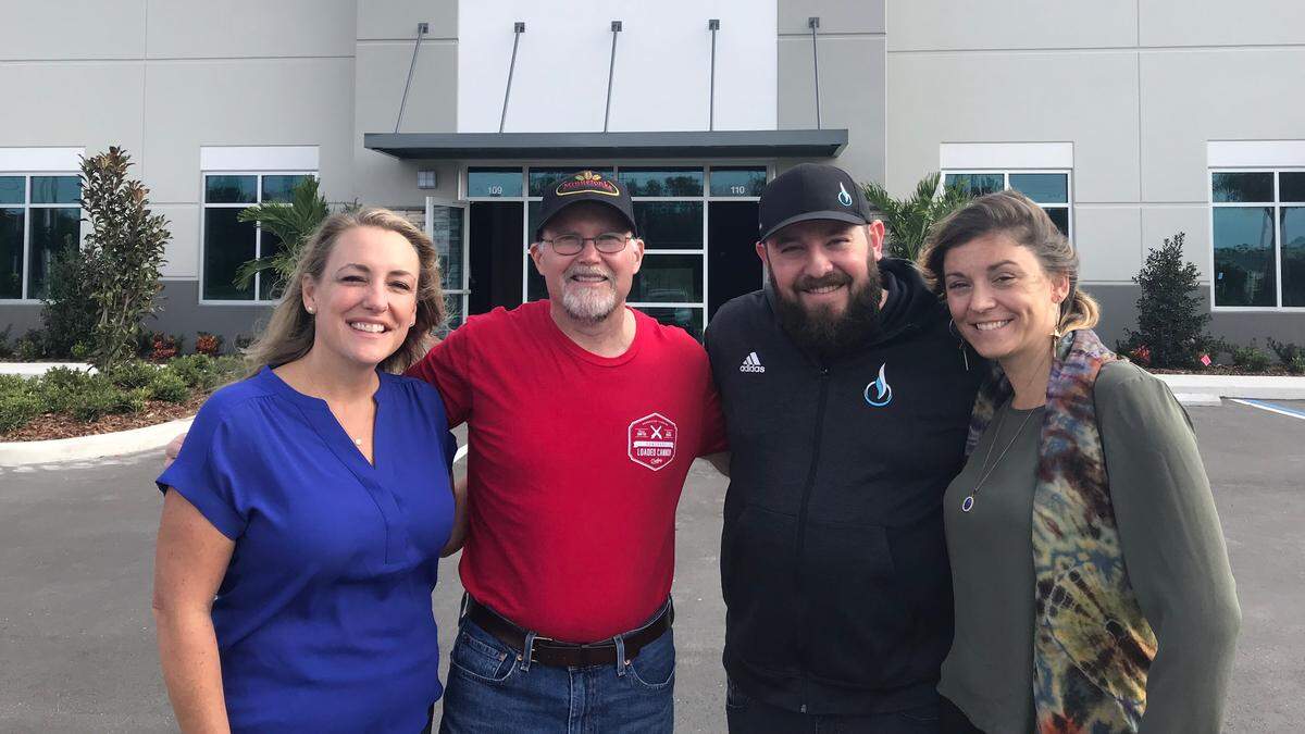 Members of the team at Loaded Cannon Distillery include, from left, Lisa Lehnert, Steve Milligan, Justin Hertz, and Michelle Russell. The new business is expected to open at Lakewood Ranch in early 2019.