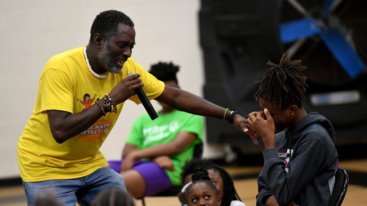 Author Vincent Taylor makes reading fun with children at the 13th Ave Center through music and audience participation. The Rosalyn Walton Education and Enrichment Services, Inc along with the 13th Avenue Dream Center is hosting the 6th Annual Juneteenth Reading Conference and Community Festival Friday and Saturday.