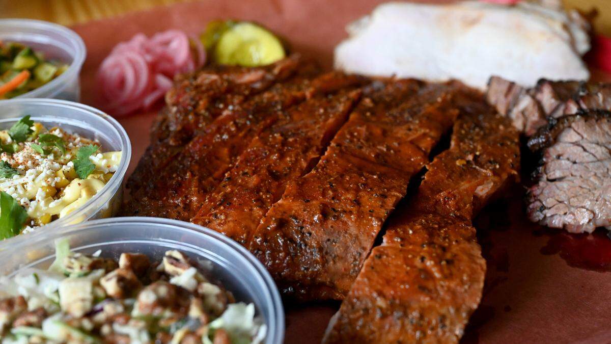 Brisket, ribs, turkey and sides served on a tray at the Twisted Pit BBQ on Main Street in Lakewood Ranch.