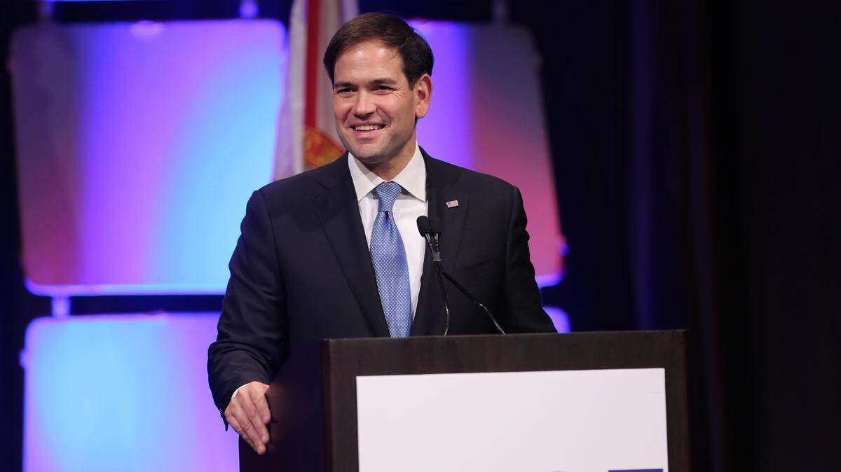 Republican presidential candidate, Sen. Marco Rubio, R-Fla., speaks at the Sunshine Summit opening dinner on Thursday, Nov. 12, 2015, in Orlando, Fla. The dinner was held the night before the state GOP kicks off a two-day event in which several presidential candidates will address Republican Party activists. (Tom Benitez/Orlando Sentinel via AP) MAGS OUT; NO SALES; MANDATORY CREDIT