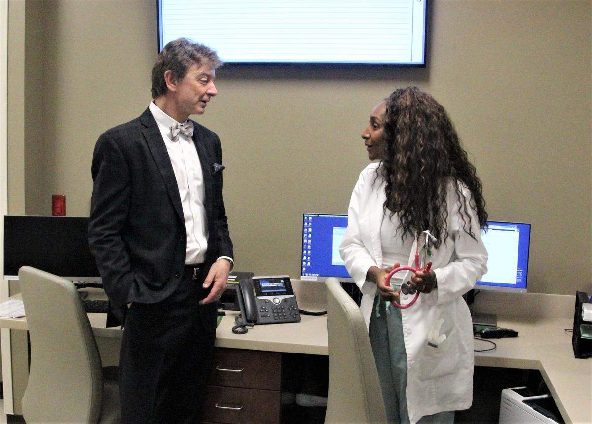 Bob Meade, CEO of Doctors Hospital of Sarasota, talks to emergency room physician Dr. Daphnee Moise in the new emergency room at the new free-standing emergency room at 5800 State Road 70 E.