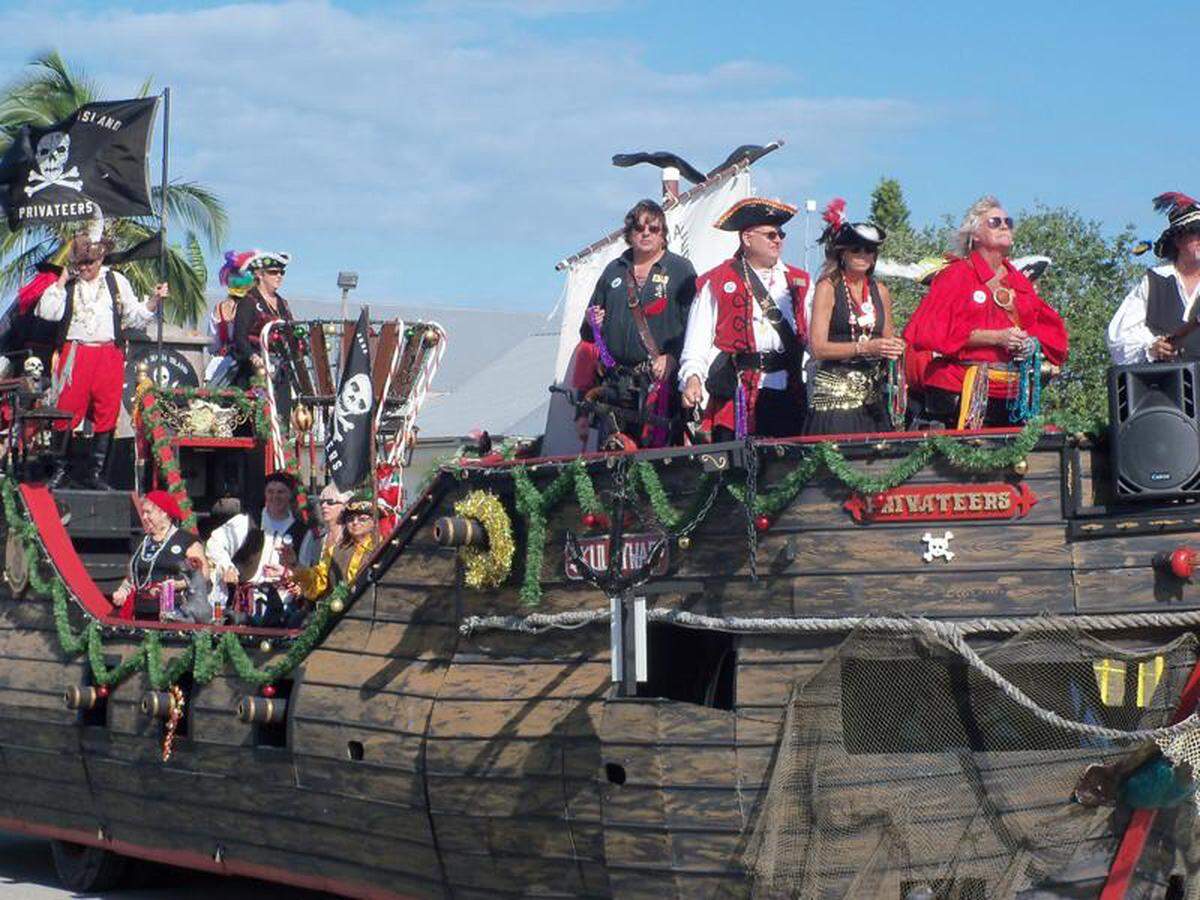 The Anna Maria Island Privateers float past crowds during a past Christmas parade on Anna Maria Island.