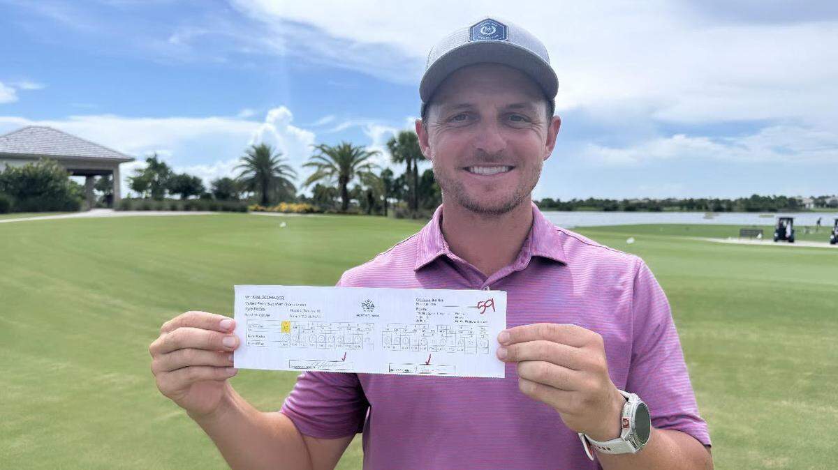Lakewood Ranch resident Kyle Rodes, 29, poses with his scorecard after shooting a 59 on Tuesday, July 16, 2024 at the Esplanade at Azario Lakewood Ranch golf course. It’s a course record.