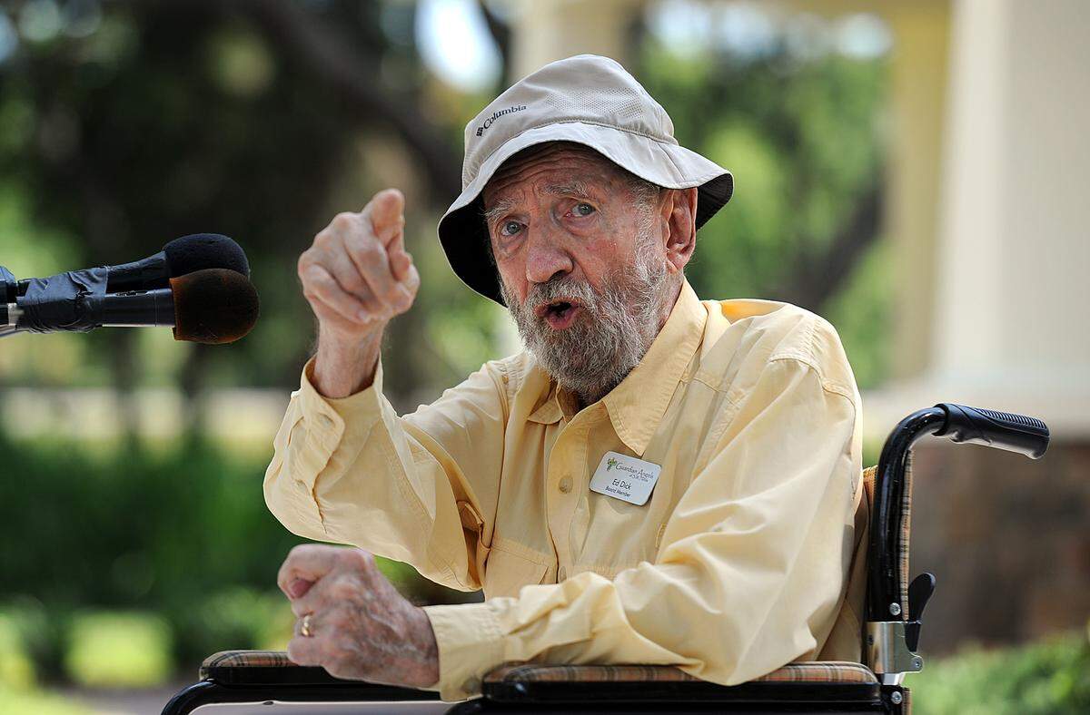 7/12/2015--Ed Dick addresses a crowd at the dedication of the third foster family home by the Guardian Angels and Florida Baptist Children’s Homes at their Manasota Campus in Palmetto.T