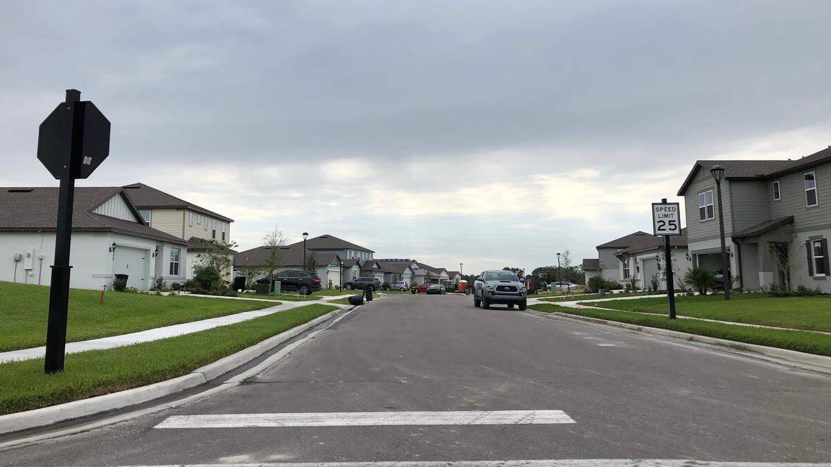 12/04/2020--Helping drive the expansion of retail business in the Parrish and North River area is the 25,000 new homes that have already been approved for construction, or for which approvals are being sought. Shown above is a street in North River Ranch.