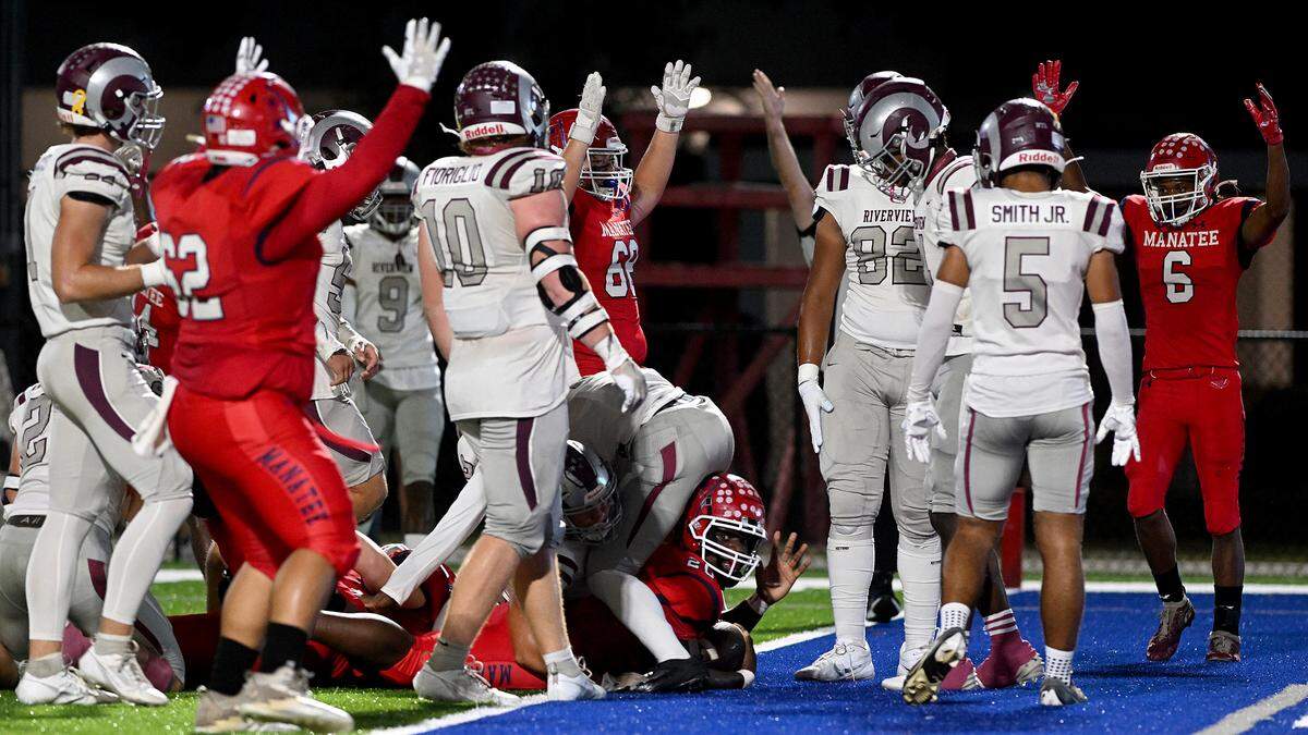 Manatee celebrates a touchdown at Joe Kinnan Field at Hawkins Stadium on Friday, Nov. 17, 2023.
