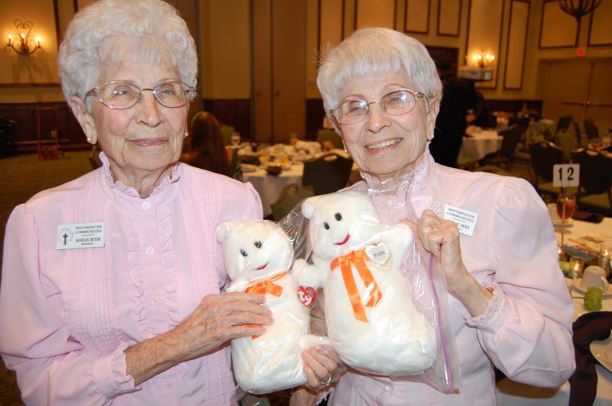 Marian Boyer, left, and Millie Dost are twin sisters who served as nurses during World War II. Marian served as a lieutenant in the Navy, while Millie served as a lieutenant in the Army. They are shown in a 2012 Bradenton Herald file photo.