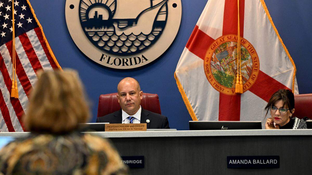 County commissioners Kevin Van Ostenbridge and Amanda Ballard listen to information from Rossina Leider, Planning Section Manager, during a meeting for Linger Lodge rezone and preliminary site plan on Tuesday, Sept. 7, 2023.