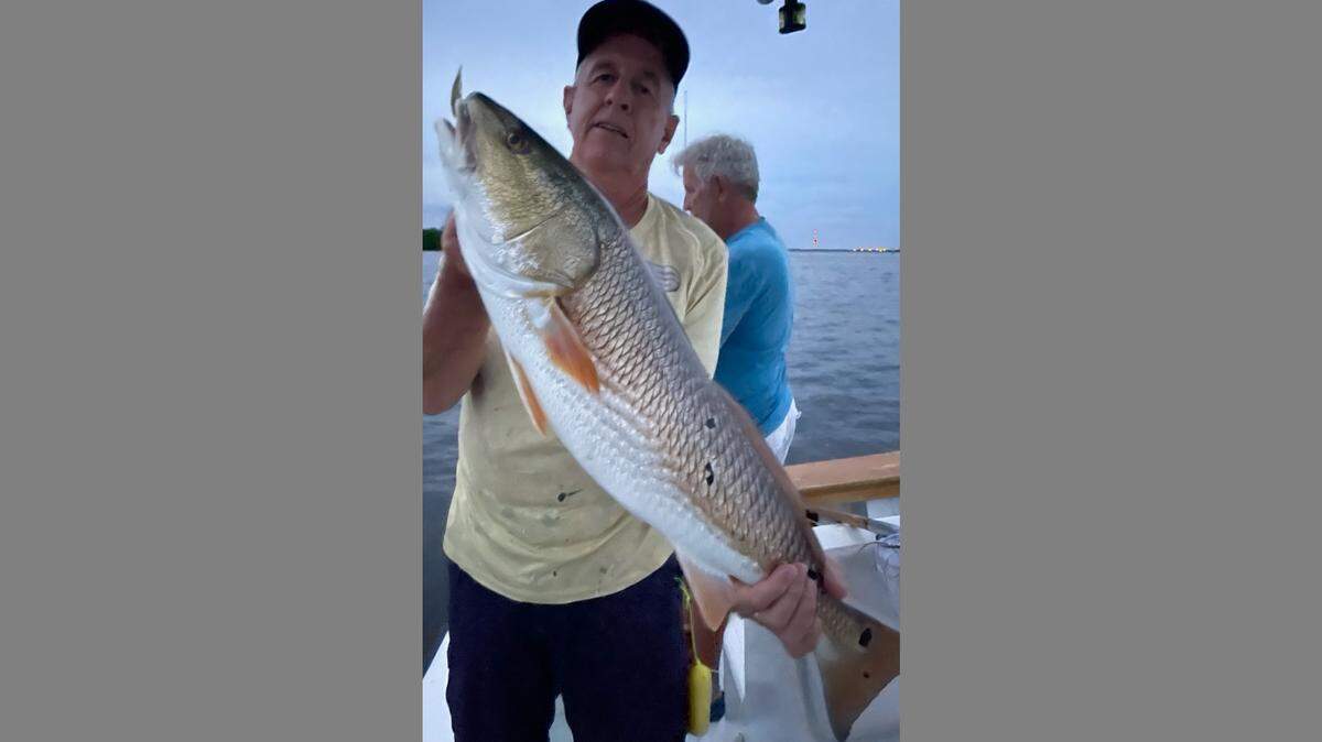 Rob Chapman with a 32-inch redfish caught Tuesday afternoon in Tampa Bay.