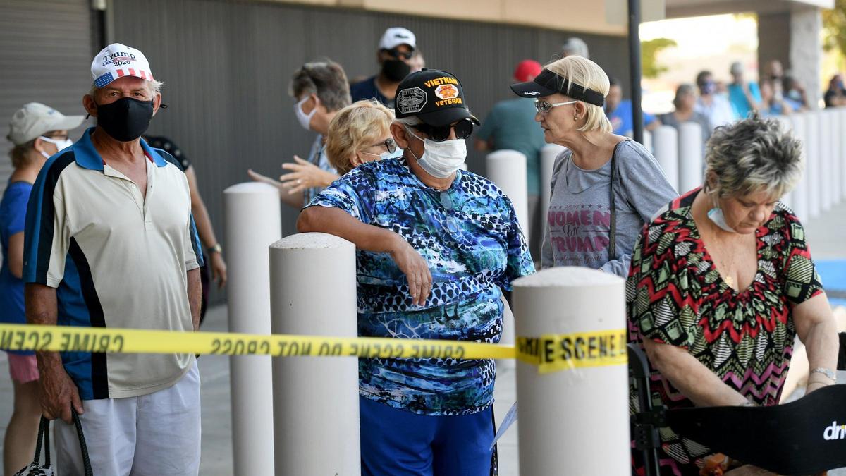 Voters line up outside the Supervisor of Elections office in Bradenton for early voting.