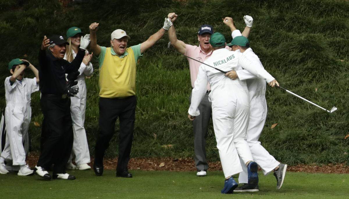 Jack Nicklaus' grandson and caddie GT Nicklaus reacts after his hole in one on the ninth hole during the par three competition at the Masters.