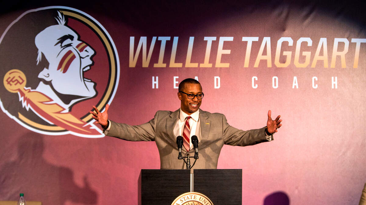 In this Dec. 6, 2017, file photo, Willie Taggart gestures as he is introduced as Florida State’s new football coach during an NCAA college football news conference in Tallahassee, Fla.