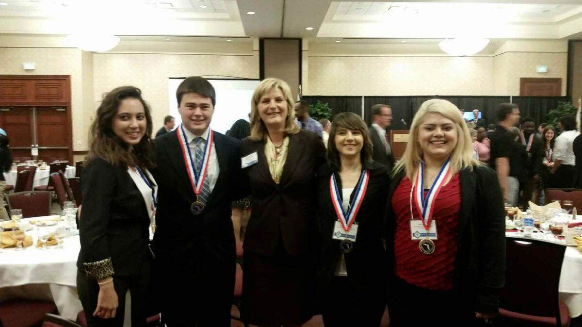 State College of Florida student Sofia Sirocchi, Jacob W. Johnston and SCF President Carol Probstfeld, Katherine Brown and Karla Reyes after the Florida All-Academic Team ceremony Thursday in Tampa.PHOTO PROVIDED