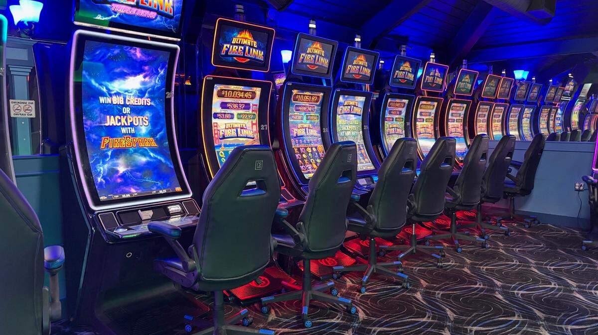 Slot machines are lined up inside Good Times Arcade in Bradenton during a gambling raid Thursday, where deputies say they seized 55 machines and more than $160,000, according to the Manatee County Sheriff’s Office.