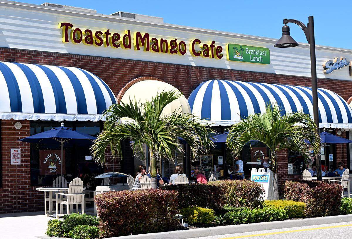 The exterior at the Toasted Mango Cafe in Holmes Beach has indoor and outdoor seating.