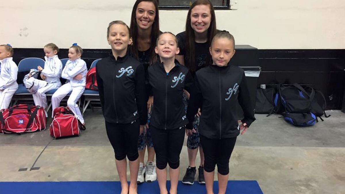 Alexandria "Ally" Marler, 20, top left, is pictured here with some of her young athletes while she was coaching gymnastics at South Florida Gymnastics in East Bradenton. Marler lost her life on May 6 when she was killed by a drunk driver, now known to be a nine-year-veteran deputy with the Pinellas County Sheriff's Office. Provided photo