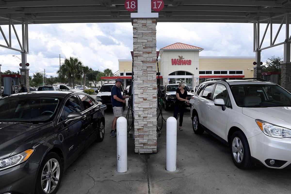 Drivers filling up cars with gas at a WAWA in Bradenton.