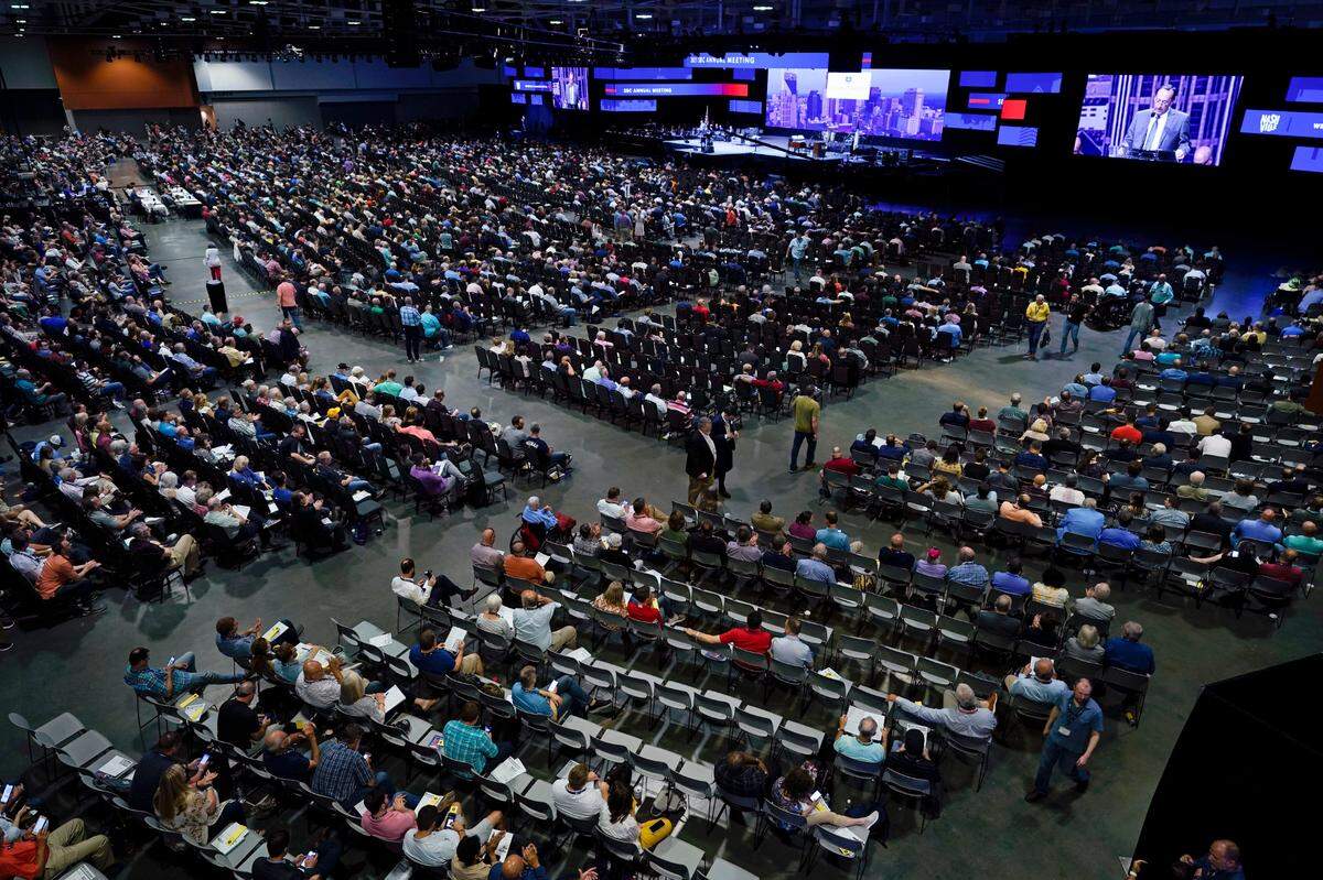 In this June 16, 2021, file photo, people attend the morning session of the Southern Baptist Convention annual meeting in Nashville, Tenn.