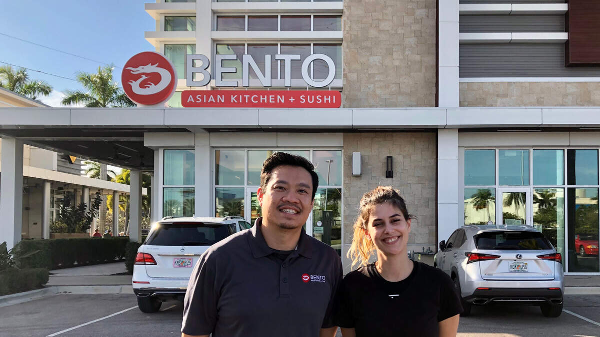 01/19/2021--Bento Asian Kitchen + Sushi opened recently in Unit 5 of 190 N. Cattlemen Road in the University Town Center. Shown above are regional manager Ron Auyong and restaurant manager Teresa Piloto.