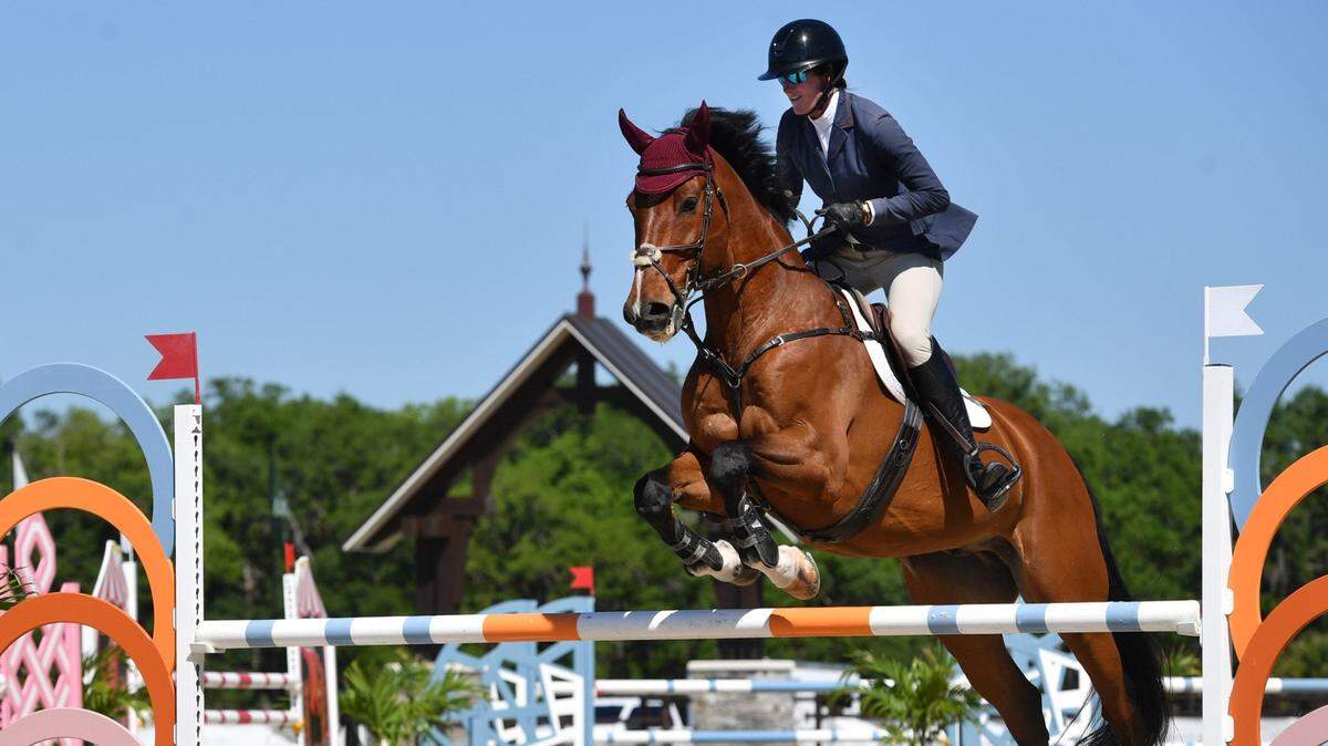 A competitor and her horse navigate a show jumping course Wednesday, Mar. 20, 2024 at TerraNova Equestrian Center in Myakka City. Olympians and Olympic-hopefuls will compete for $65,000 prize on Saturday in the TerraNova Winter Series FEI Grand Prix Show Jumping.
