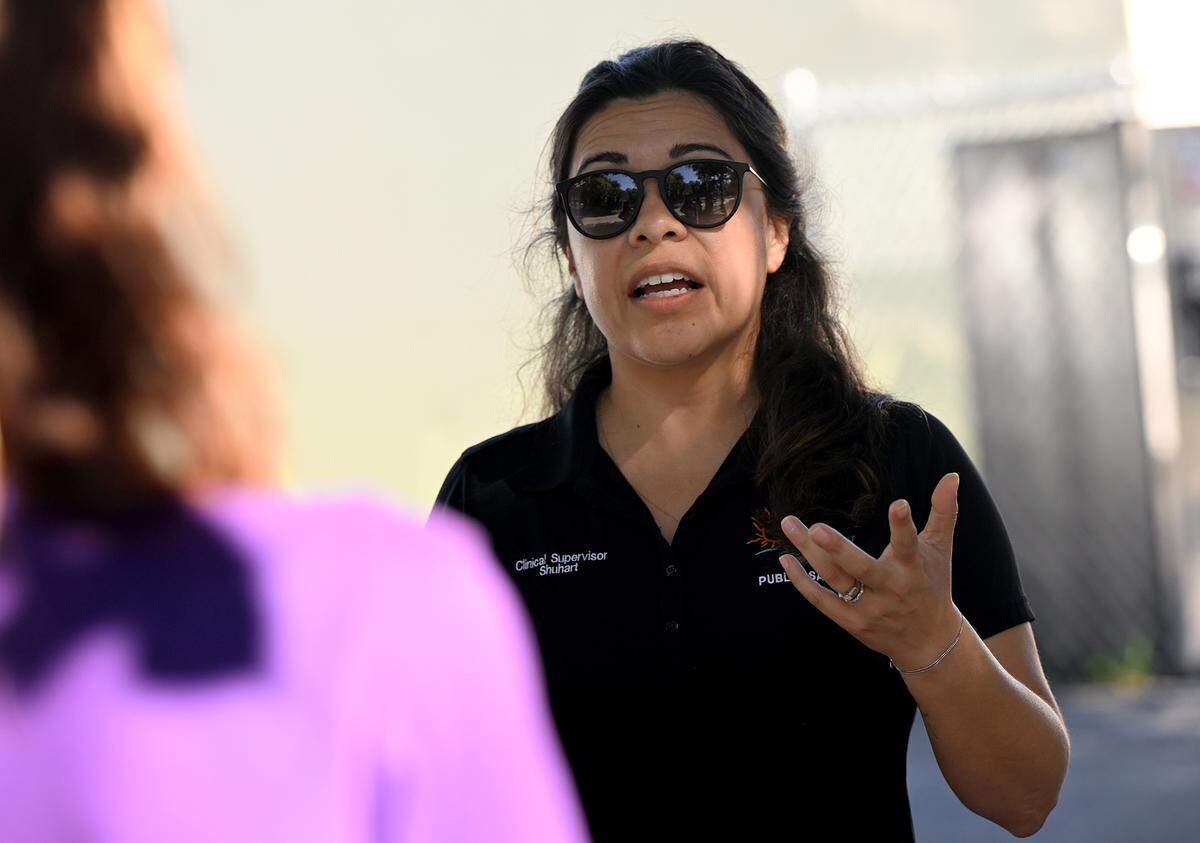 Sonia Shuhart with Manatee County EMS works with Bradenton Police as part of a homeless outreach team to build relationships with locally unhoused people and connect them with services and resources.