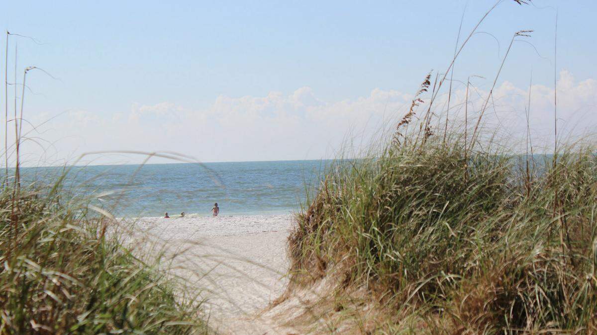 The warmth ad beauty of Anna Maria Island continues to call to beach lovers near and far. 
 JAMES A. JONES JR./Bradenton Herald