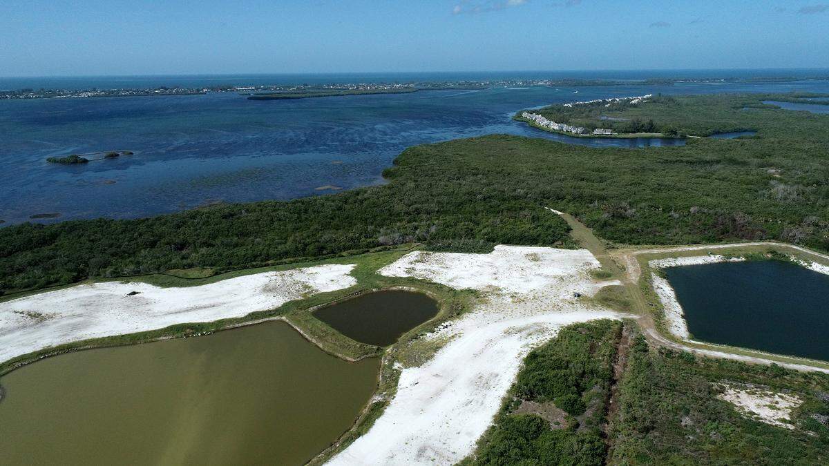 Looking westward towards Anna Maria Island from El Conquistador near the developments of Aqua, Cirrus, and soon, Lake Flores. Manatee County Government officials are on the verge of minimizing a rule that protects natural Florida wetlands from the environmental impact of developing new homes and businesses. Monday, Oct. 2, 2023.