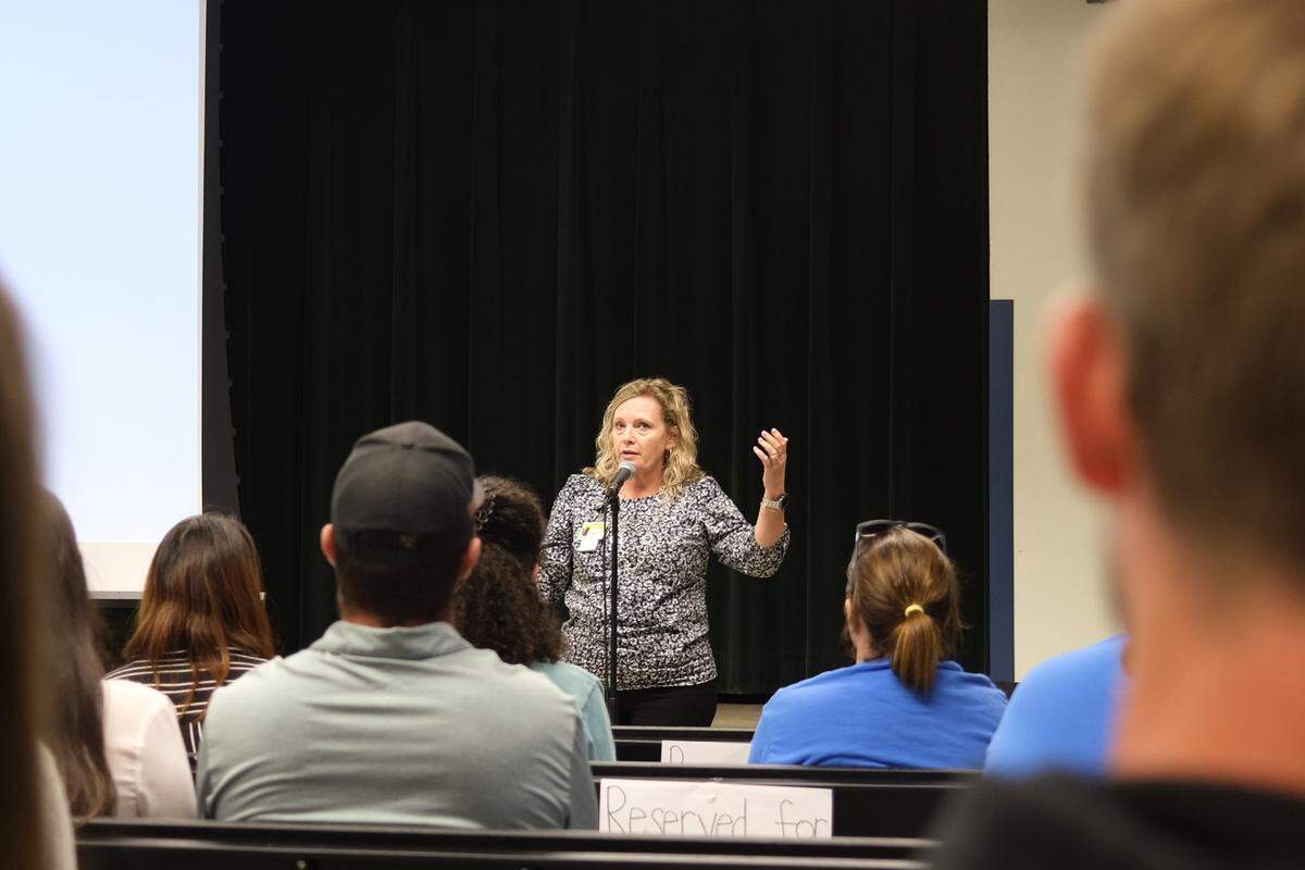 1/25/23--Palma Sola Elementary School principal Jennifer Grimes addresses hundreds of community members at a meeting to address rumors about the school potentially closing.