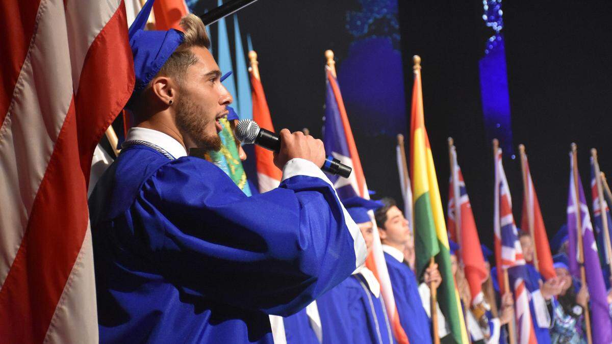 Nathan Bettger, a soccer student athlete from Bradenton, welcomes the audience to the 19th annual IMG Academy commencement ceremony on Friday night at the Van Wezel Performing Arts Hall.