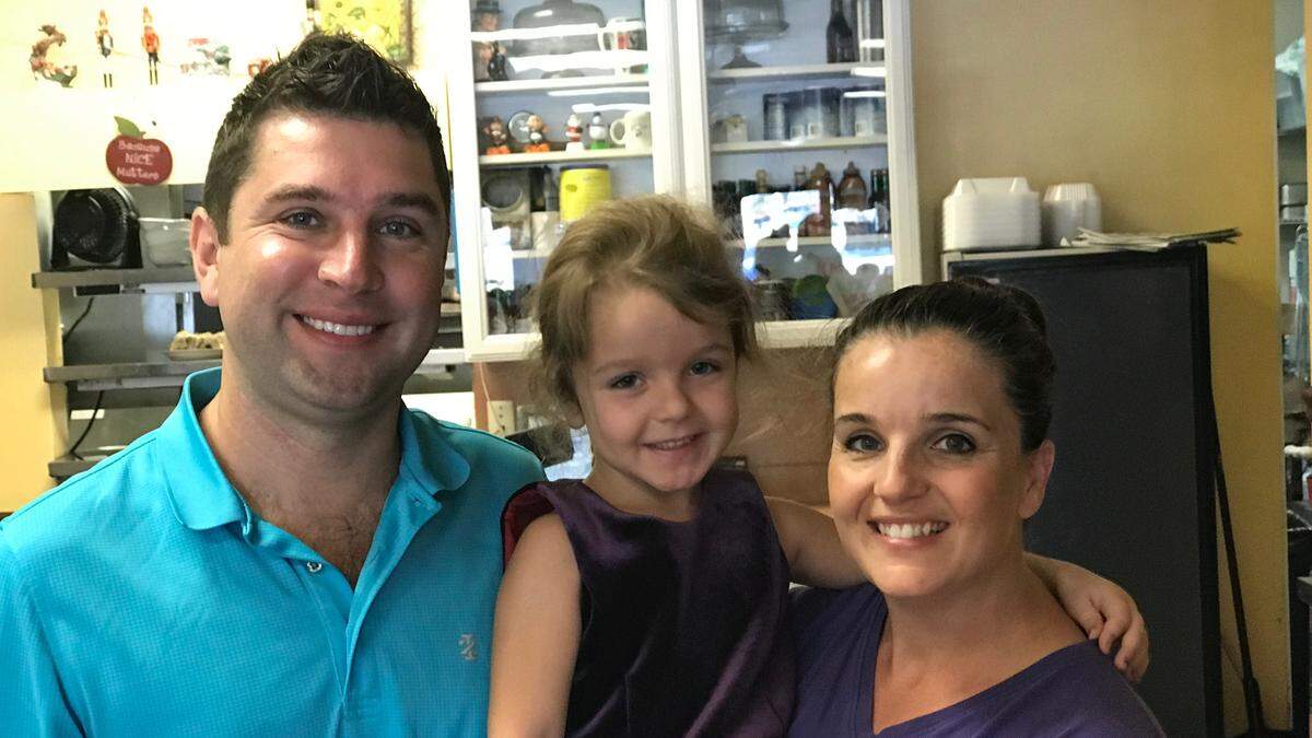Rick and Kelly Jessop, owners of Katie’s Cafe, are shown with their youngest daughter, Paige. They have owned the restaurant at 3130 53rd Ave. E., for more than five years.