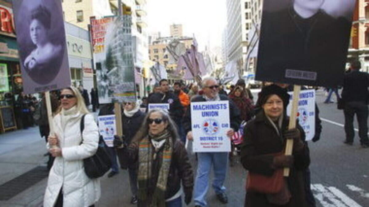 Marchers remember the 146 victims of the shirtwaist factory fire of 1911, commonly called the Triangle fire, during its 100th anniversary commemoration Friday in New York, in March 2011.