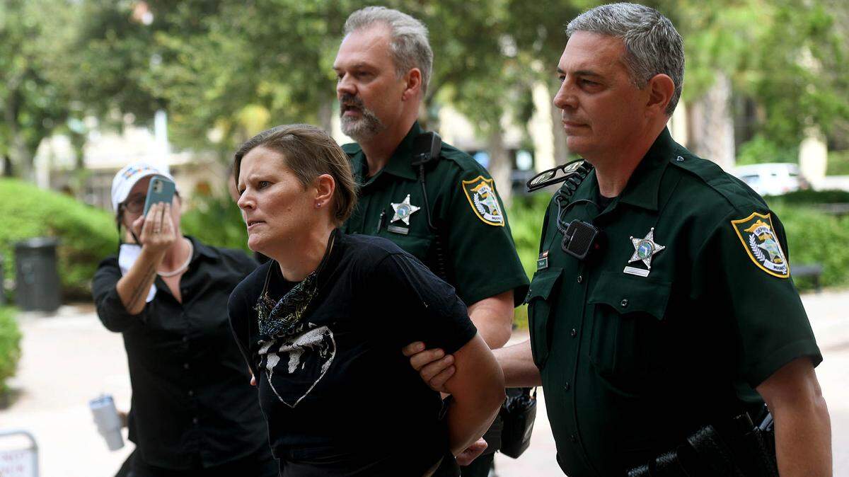 09/14/21—Protestors rally outside the county’s Administrative Center in downtown Bradenton Tuesday morning. Inside the building, the Board of County Commissioners planned to send a letter to Ashley Moody in hopes of putting local abortion restrictions in place. A woman was handcuffed and led to the Judicial Center after an emotional confrontation.