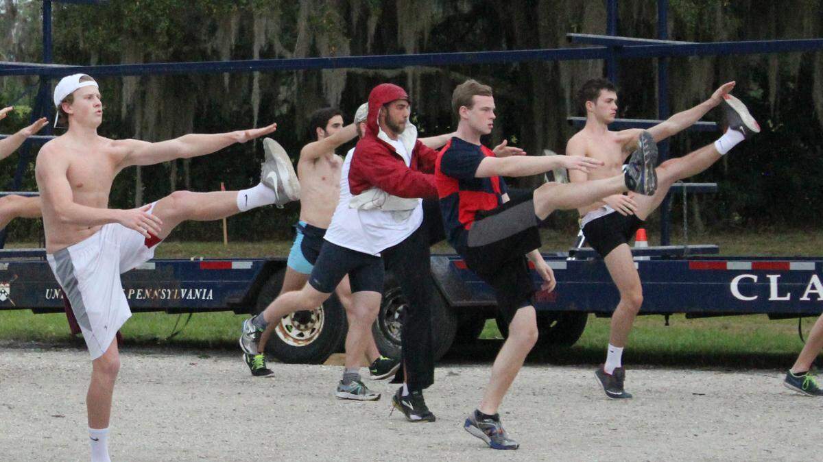 University of Pennsylvania rowers get their exercise in ahead of a rainstorm Saturday afternoon at Fort Hamer Park. 
 JAMES A. JONES JR./Bradenton Herald
