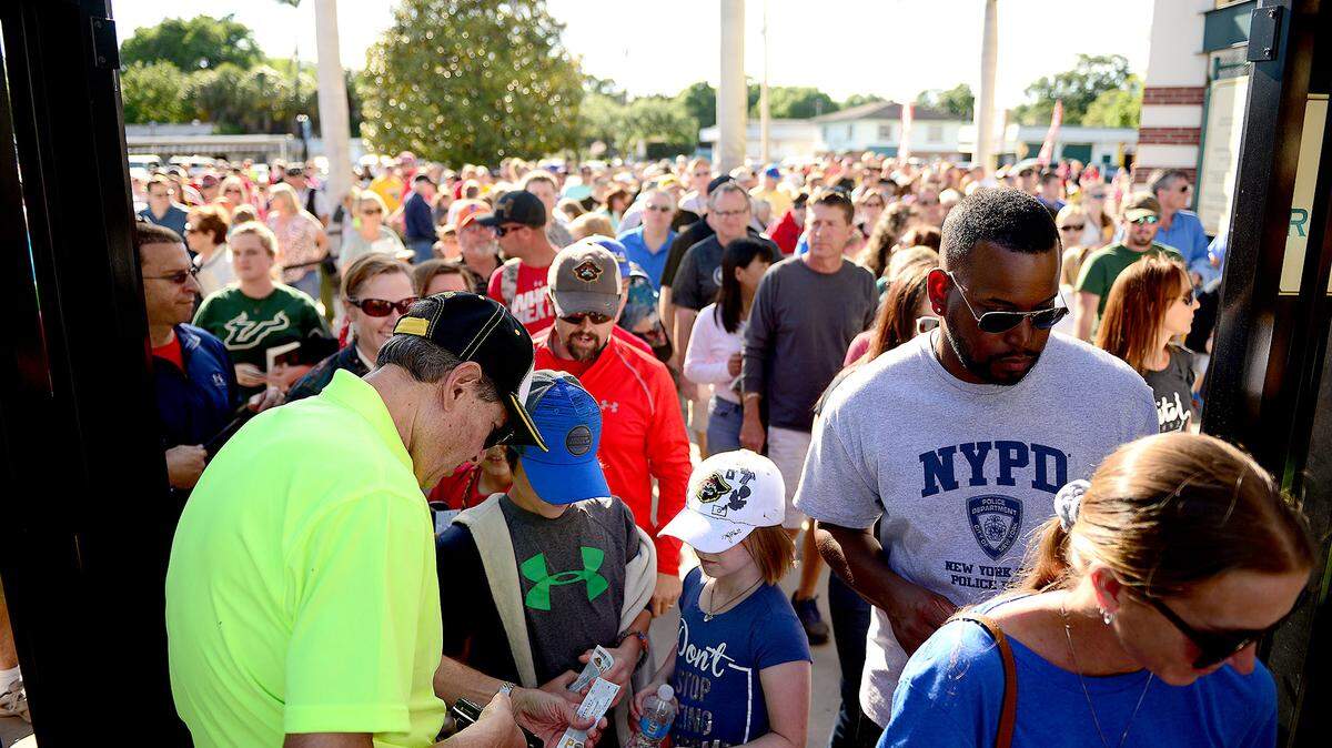 Fans file through the gate into the stadium. The Bradenton Marauders kicked off their 2016 season against the Fort Myers Miracle at McKecknie Field in Bradenton, FL on Saturday evening, April 9, 2016. Unfortunately the Marauders lost 5-1. 
 DAVID W DOONAN | Special To The Herald