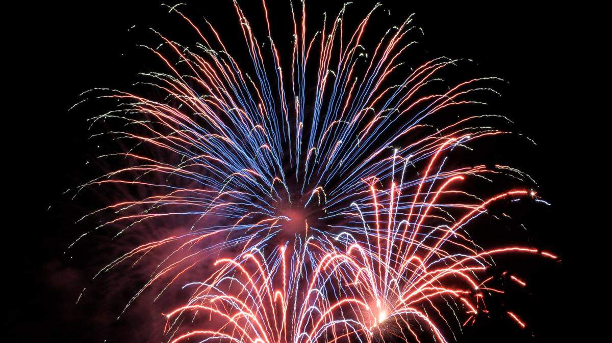 Fourth of July fireworks explode over the Manatee River in a spectacular display of color and sound.