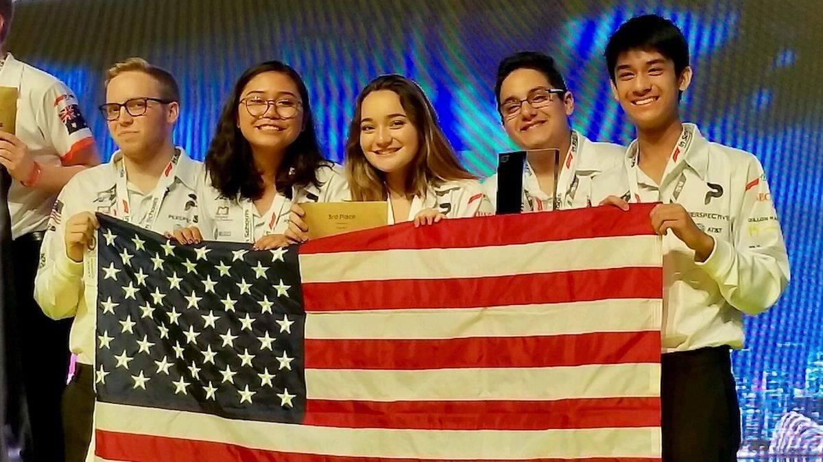 From left, Jaxson Bunes, Cassandra Atzrodt, Alana Kelly, Ahmad Ibsais and Alex Kumar. Their team, Perspective Racing, won third place at the F1 in Schools World Finals, a global competition held in Singapore.