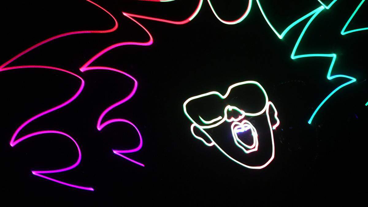 Laser light shows set to popular music are back for the summer at The Bishop Museum of Science and Nature.
