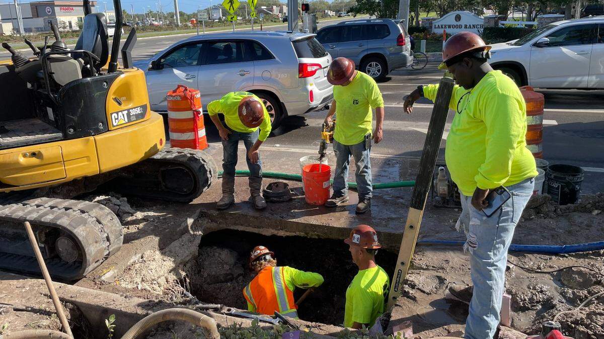 A third-party crew is working to repair a void on Lorraine Road at the State Road 70 intersection. A directional drill damaged a pipe under the road, causing a mini sinkhole to form.