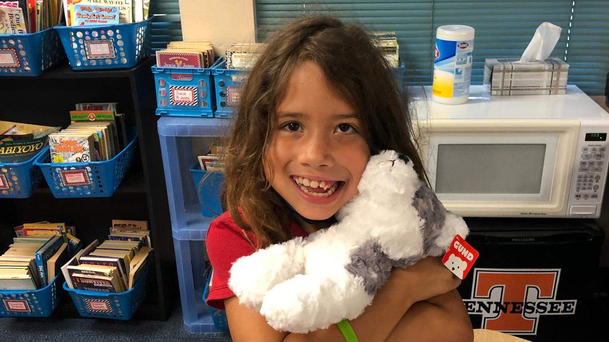 Aubrey Romero, 7, was diagnosed with a rare form of cancer. Her teacher and classmates at Sea Breeze Elementary School have rallied to raise money for her treatment and raise her spirits.