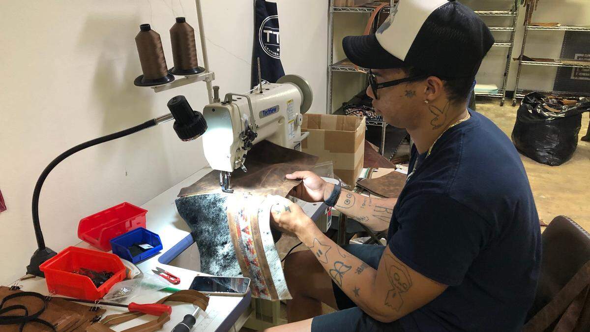 Amber and Andrew Roberts are opening TTT Leathergoods at 527 13th St. W., in downtown Bradenton on Saturday. The family-owned business custom makes purses, bags, cases and many other items from fine-grain leather. The business has a staff of eight.