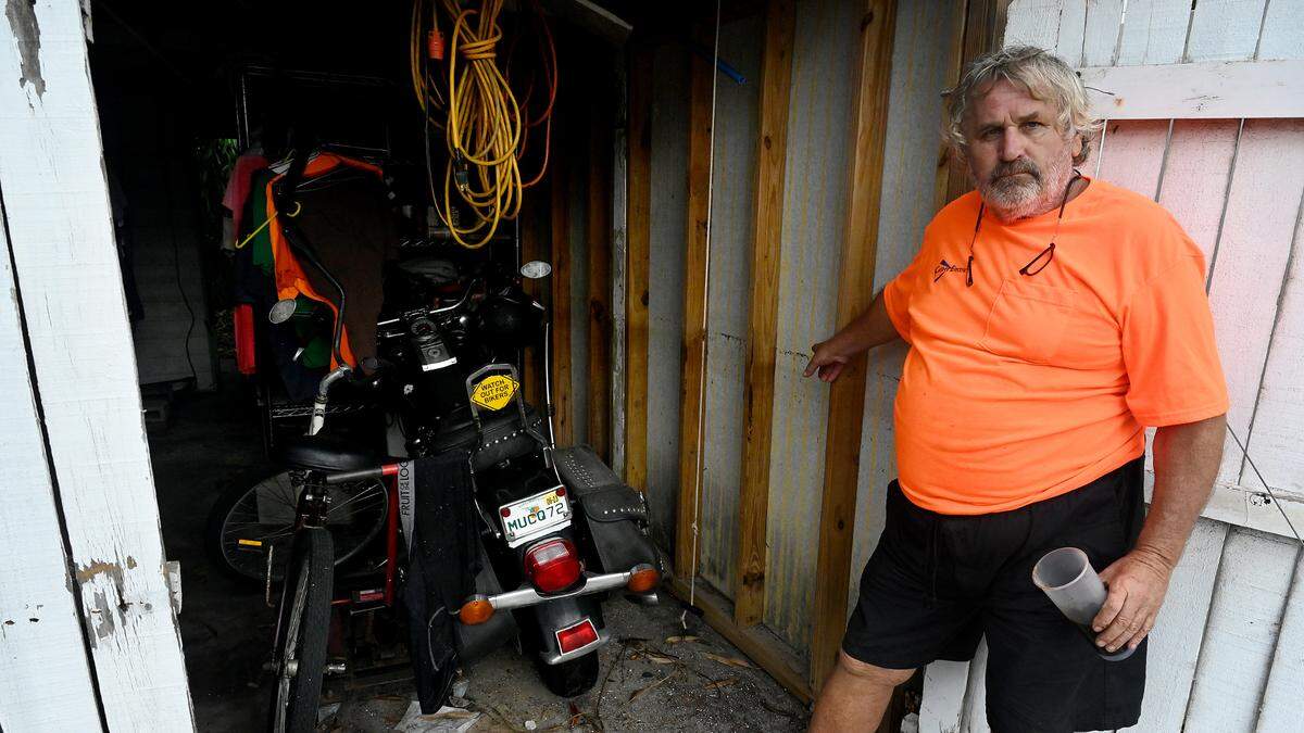 Wesley Wunz, 62, shows the water line from Hurricane Helene in Sunny Shores as Hurricane Milton approaches Manatee County on Oct. 8, 2024.