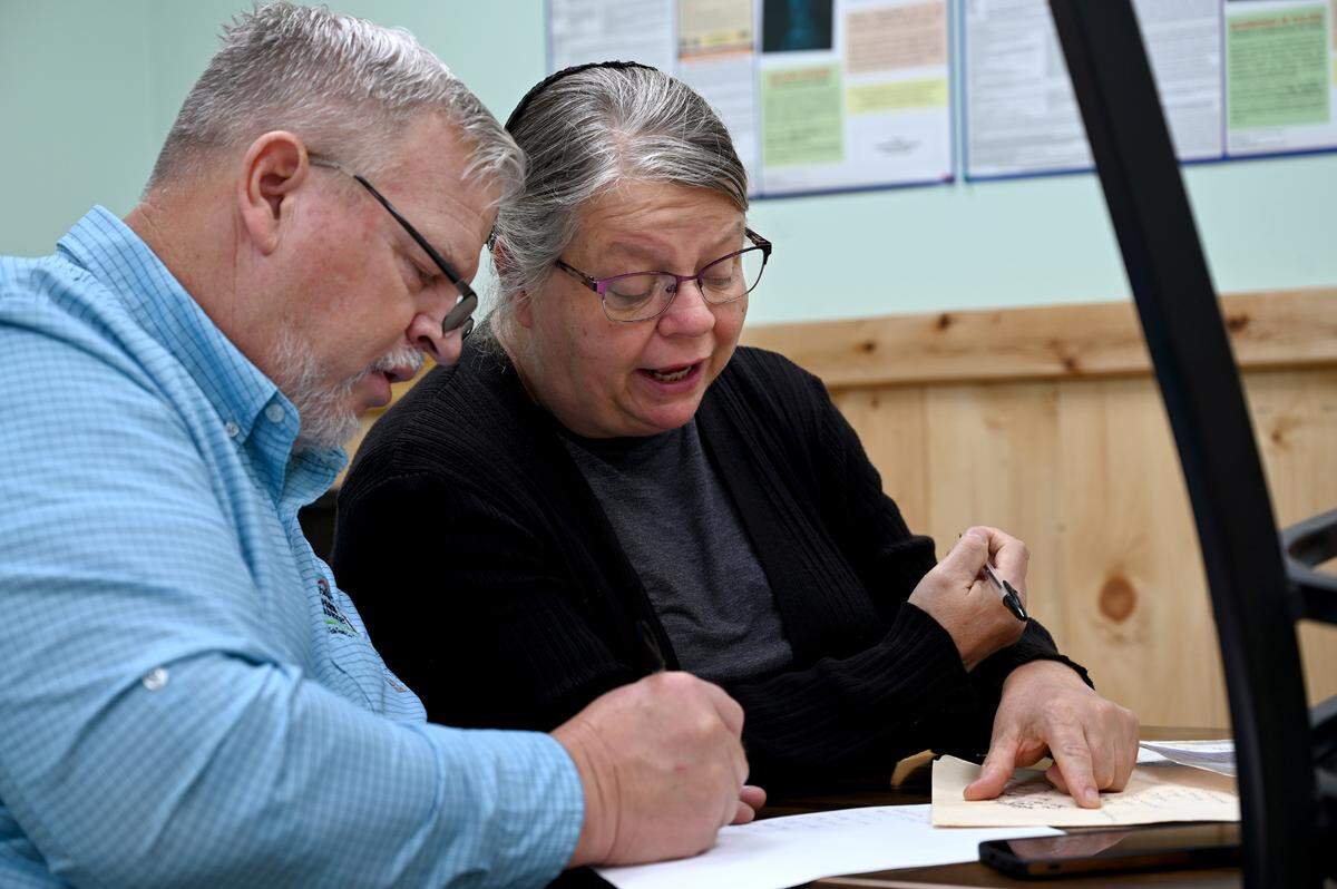 Founder and CEO of Detwiler’s Farm Markets Henry Detwiler and wife Natalie work on a donut recipe together in the break room of the newest store in Bradenton.